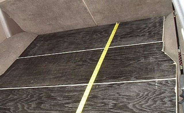 Measure length from the back side of the rear seats to the rear door.