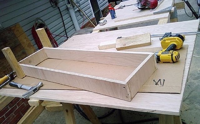 Sides glued together then reinforced with screws.