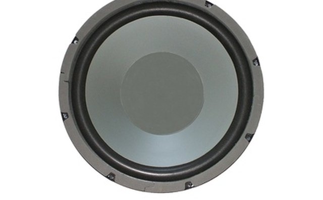 The speaker mounts to the outside of the box.