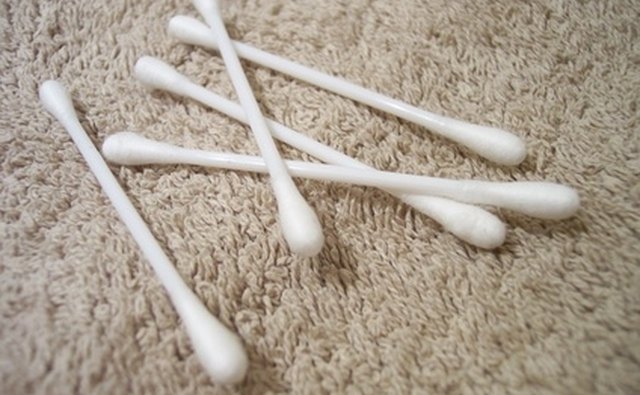 Clean with precision using cotton swabs.