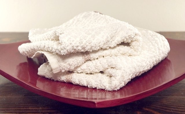 Use white towels for stain removal so you can see when the stain is transferring.