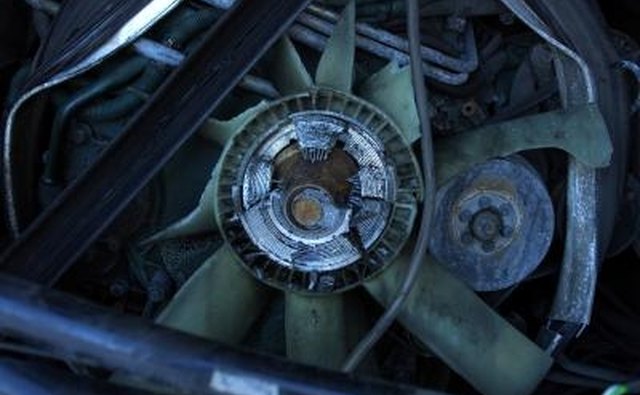 The front of the engine has several pulleys, wheels and often multiple belts.