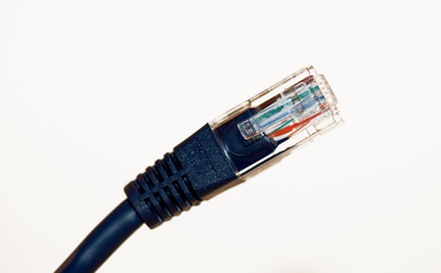The Taijin TKR900 uses a LAN network connection for downloading new songs.