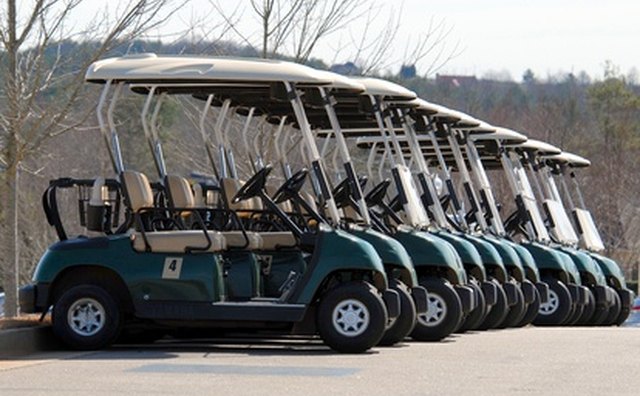 One color scheme of the 2003 Club Car included green with beige trim and canopy top.