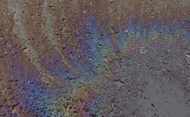 Check for oil leaks and low fluid