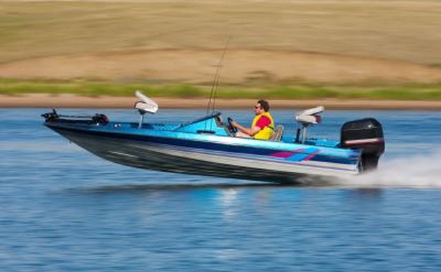 Speed boat on lake with Mercury outboard