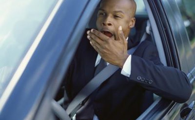 Man in car idling.