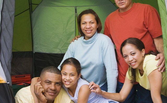 The prayers of the husband shelter his family, much as a tent does.