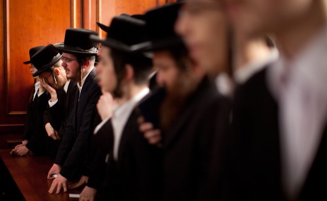 Orthodox Jewish men wear payos, or side curls.
