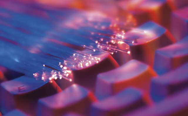 Information travels through fibers at light speed.