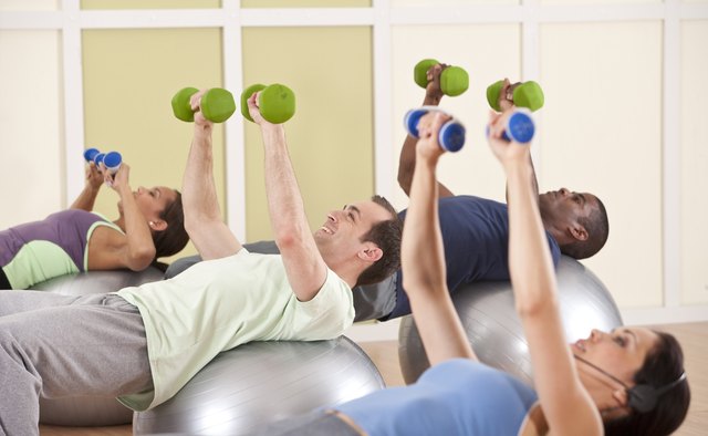 Performing a chest press on a stability ball increases the challenge.
