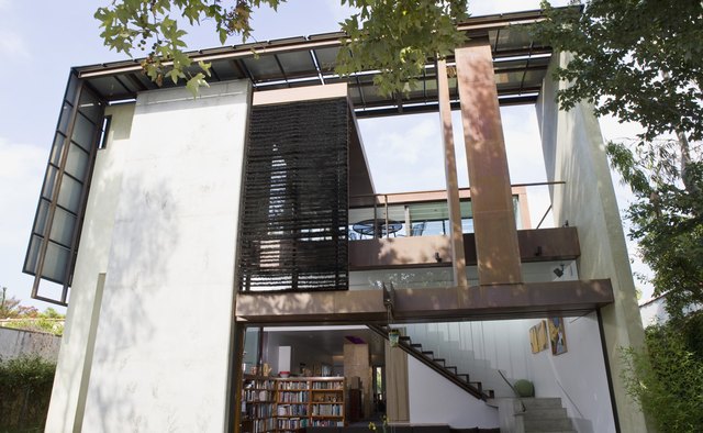 Strong, geometric shapes characterize the exterior of a contemporary house.