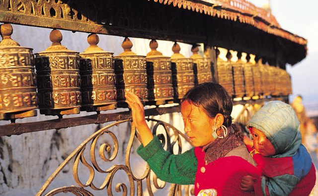 Good karma is created through the spinning of prayer wheels, which send prayers through the wind to the world.
