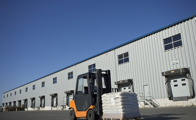 Many forklifts are designed to carry loads on pallets.