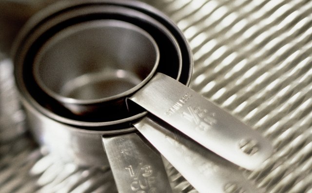 Hands-on use of measuring cups in the kitchen help with fractional concepts.