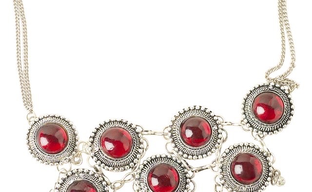 Avoid warm color tones when styling your silver dress.