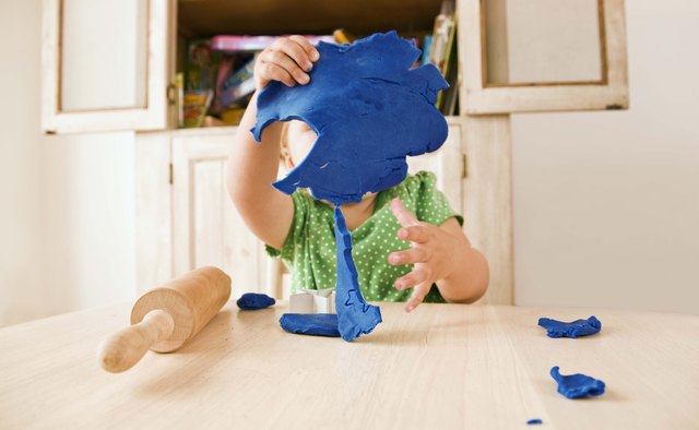 Learning about form through clay keeps young children busy and involved.
