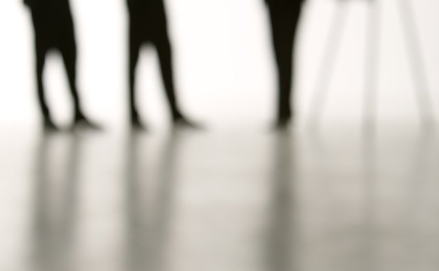 A training and development manager works directly with employees to coach them.