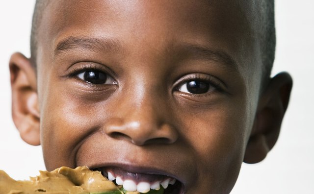Smear peanut butter on celery sticks and add raisins for the classic snack