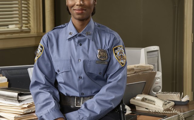 Police officers work with other agencies to ensure the safety of children.