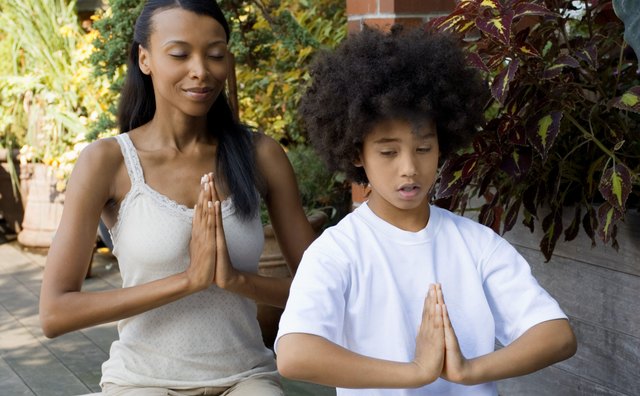 Meditate with your child to help him stay focused.