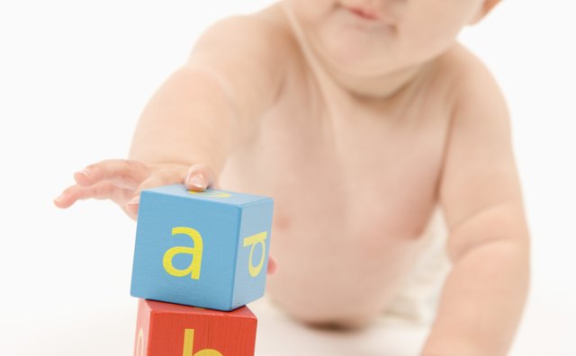 Simple stacking play helps encourage motor skills, constructive play and persistence.