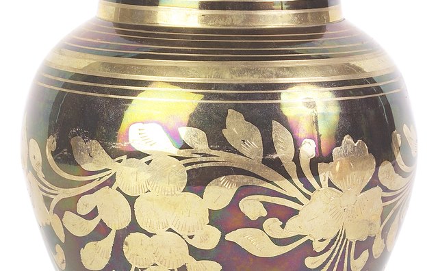 Cremated remains are stored in urns and buried in mausoleum niches.
