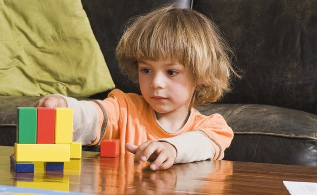 Create patterns from blocks using just two colors at first.