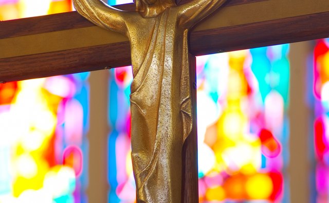 Jesus is depicted on a cross.