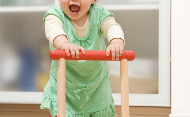 Pushing toys help build strength in the arms and back.