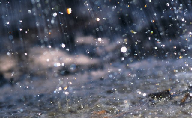 Acid rain, which can occur naturally or articifially, but changes the composition of rock.