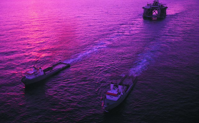 Burials at sea are traditionally conducted aboard a ship.
