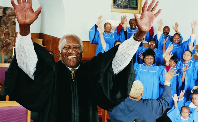 The preacher in an African American church wants to hear the crowd respond to the sermon.