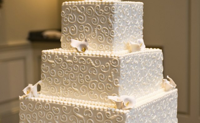 A close-up of an elegant wedding cake.