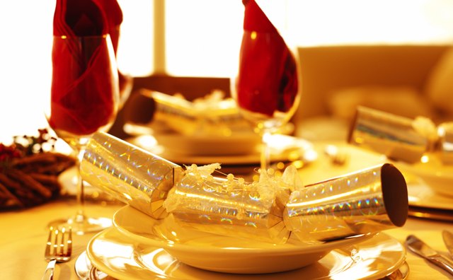 Water glasses are placed to the left of all other dinner glasses.