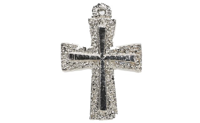 Pendants and charms can be engraved to commemorate the baptism.