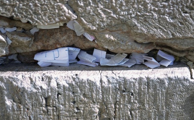Prayers tucked into a crevice in the Western Wall.