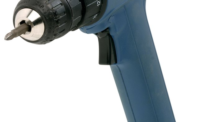 Use a cordless drill because your home's power needs to be off when drilling through the floor.