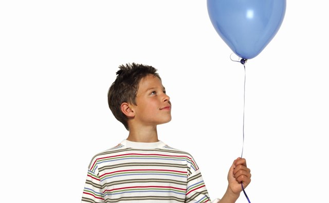 Centripetal force will keep a penny spinning inside a balloon.