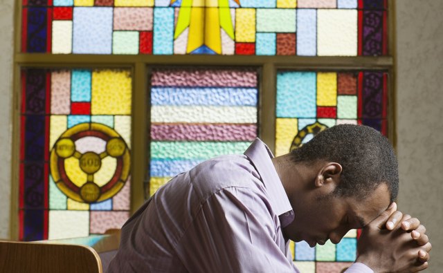 Man praying in church