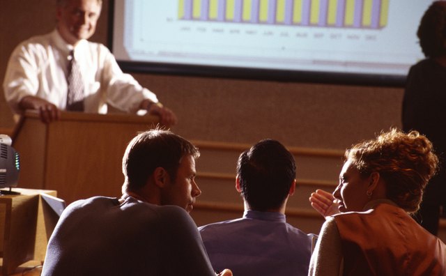 Organizing staff meetings is part of the role.