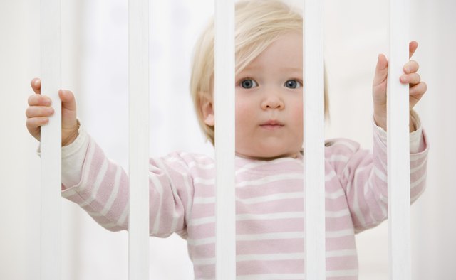 Some playpens have wood slats -- make sure they're up to code.