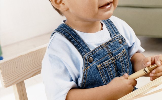 Two-year-olds love to make a mess with colors. Hey, whatever keeps them busy!