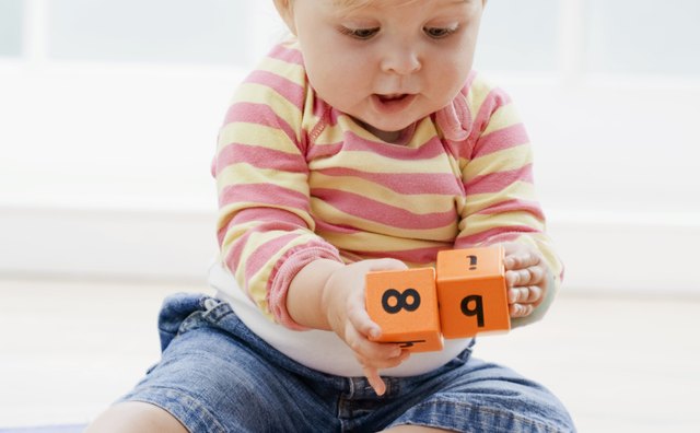Container play is a simple way to encourage an infant's sensorimotor development.