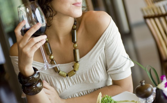 A guest enjoys gourmet food at a wedding.