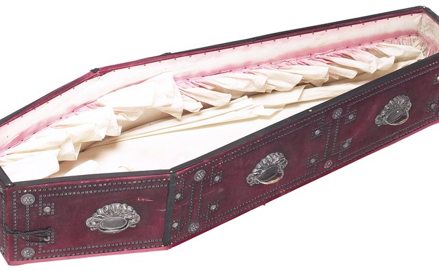 The vigil often includes an open casket and embalmed corpse.