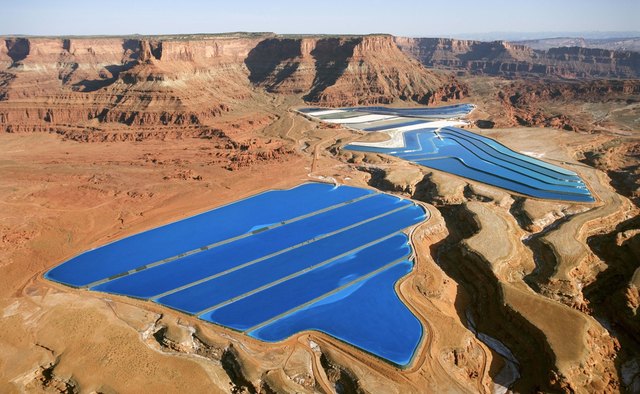 Heavy rainfall can overload waste-water treatment facilities, releasing point source pollutants.