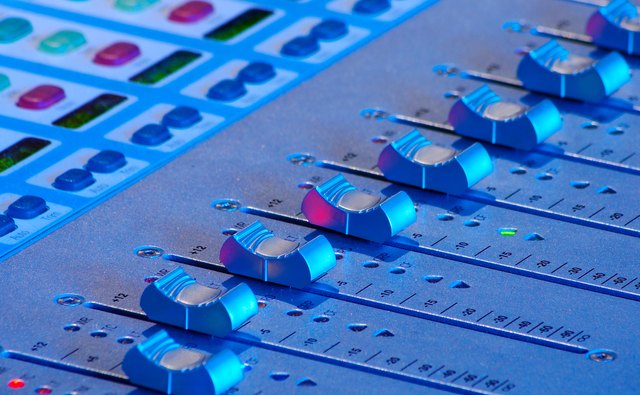 Both producers and engineers work the soundboards.