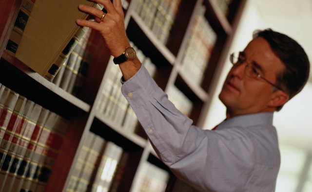 An attorney or a title company can research a property's chain of title.