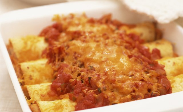 Defrost frozen enchiladas overnight and bake for 30 minutes.